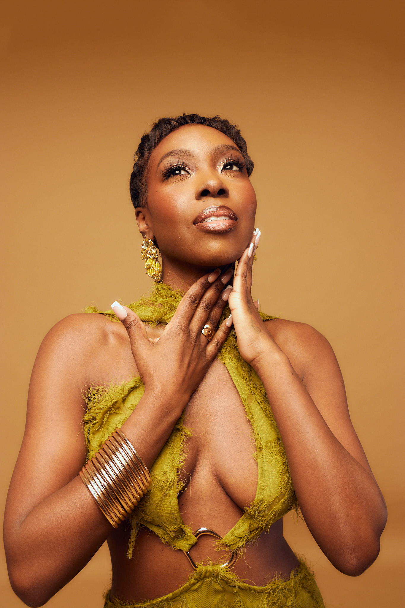 Cleonie McLean in an olive-green editorial portrait