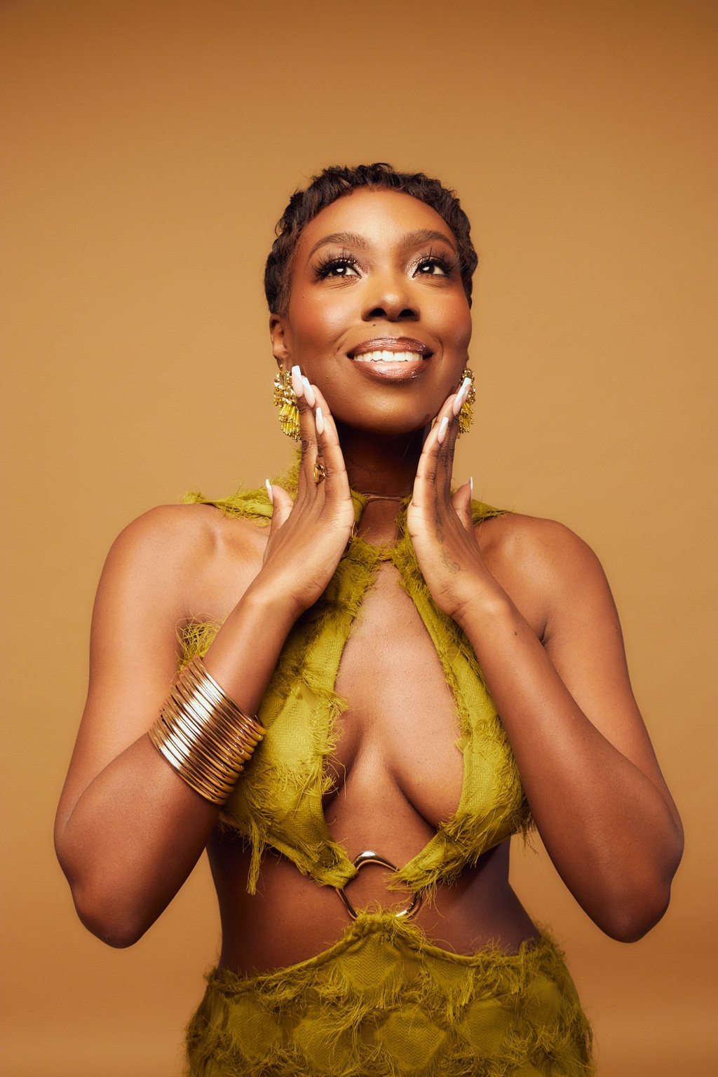 Cleonie McLean in an olive-green editorial portrait
